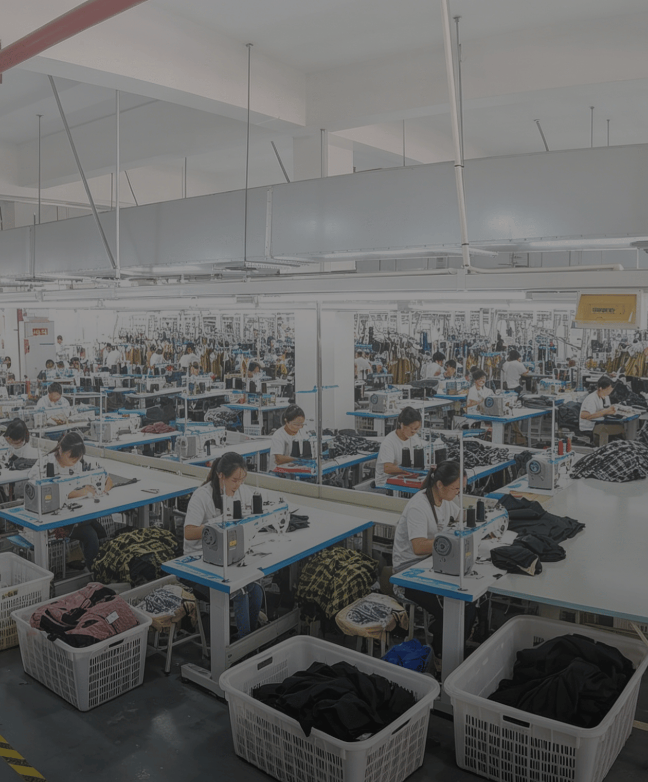 activewear production checklist workspace with fabric swatches, sports bra sample, leggings, logo placement notes, packaging, and inspection sheet